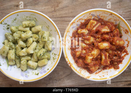 tomato and pesto gnocchi a kind of dumplings usually of potato and flour Stock Photo