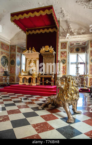 Hillerod, Denmark - June, 2016: Throne Hall of Frederiksborg Castle. The royal throne in the interior of the Frederiksborg Castle. Stock Photo