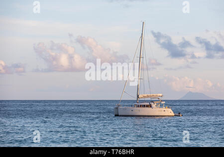 Catamaran off shell beach in Gustavia, St Barts Stock Photo