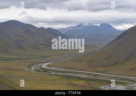 Dalton Highway and Trans-Alaska Pipeline, Brooks Range, Alaska, USA Stock Photo