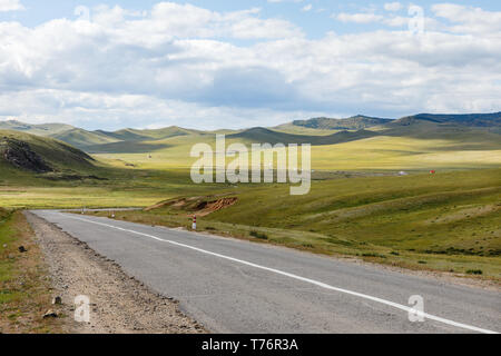 asphalt road Darkhan-Ulaanbaatar in Mongolia, Mongolian landscape, Tuve Aymak. Stock Photo