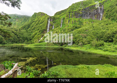 Beautiful hiking scenics at the Poco Ribeira do Ferreiro waterfalls on Flores island in the Azores. Stock Photo