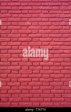 Vertical Image of Raspberry Red Colored Brick Wall for Background, Texture or Pattern Stock Photo