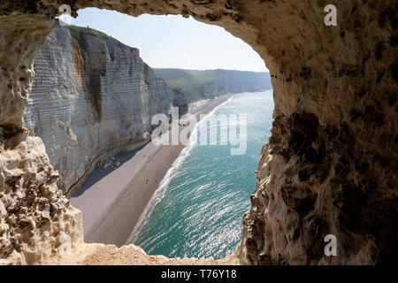 France, Normandy: white chalk cliifs of beach Etretat, view from cave Stock Photo