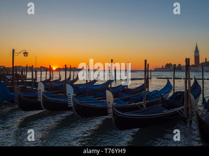 Venetian gondolas at sunrise Stock Photo - Alamy