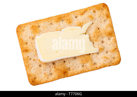 Cheese cracker with a slice of brie viewed from overhead. Sourdough crackers for a quick snack, UK. Cut out or isolated on a white background Stock Photo