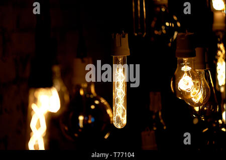 Bulbs Erickson suspended with the cells with the decoration bird.Yellow warm lamp light Stock Photo