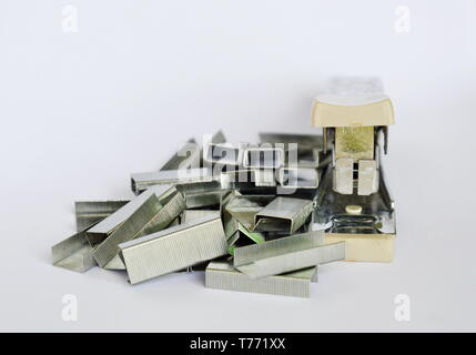 stapler and refill wire on white background Stock Photo