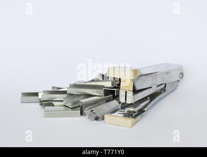 stapler and refill wire on white background Stock Photo