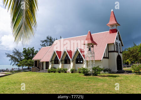 Notre Dame Auxiliatrice Church with distinctive red roof at Cap Malheureux, Mauritius, Africa Stock Photo