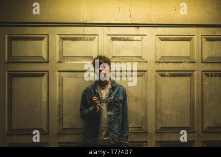 Young stylist model with denim jacket Stock Photo