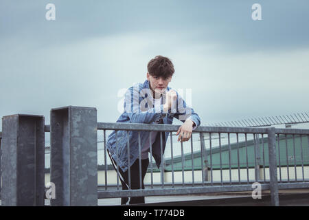 Young stylist model with denim jacket Stock Photo