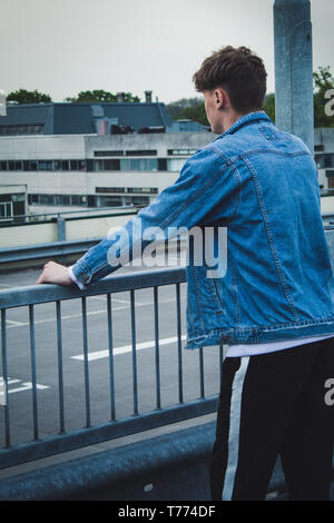 Young stylist model with denim jacket Stock Photo