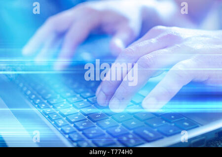 Close up of business man hand working on  laptop computer Stock Photo