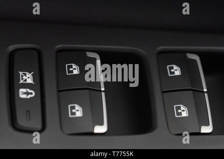 Window lifter and mirror adjustment buttons in car Stock Photo