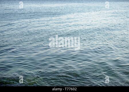 Close-up view of water ripple on sea surface. Stock Photo
