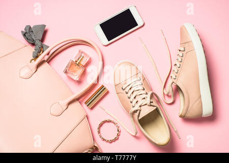 Woman flat lay background on pink. Stock Photo