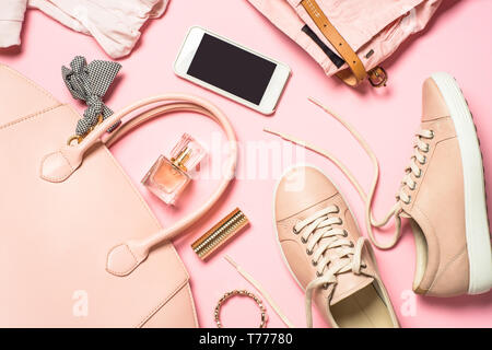 Woman flat lay background on pink. Stock Photo