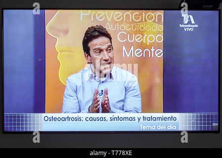 Cartagena Colombia,TV television monitor screen flat screen,medical program,Spanish language,osteoarthritis,telemarketing,Hispanic Latin Latino ethnic Stock Photo