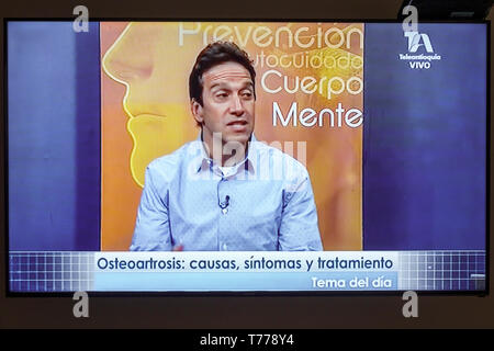 Cartagena Colombia,TV television monitor screen flat screen,medical program,Spanish language,osteoarthritis,telemarketing,Hispanic Latin Latino ethnic Stock Photo