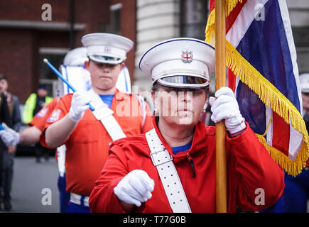 Manchester, UK. 04th May, 2019. Amy official seen marching with a flag. Thousands of people took part in a solidarity march in support for the veterans in Northern Ireland. Credit: SOPA Images Limited/Alamy Live News Stock Photo