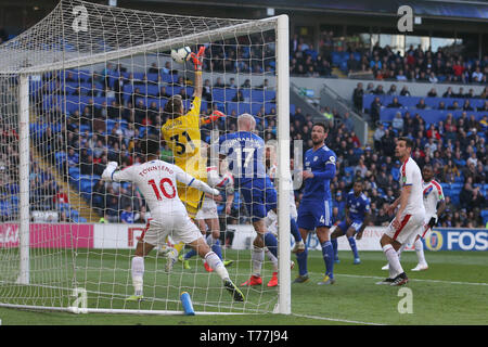 Cardiff, UK. 04th May, 2019. Vicente Guaita, the goalkeeper of Crystal Palace FC saves from Sean Morrison (4) and Aron Gunnarsson of Cardiff city (17).Premier League match, Cardiff City v Crystal Palace at the Cardiff City Stadium on Saturday 4th May 2019.  this image may only be used for Editorial purposes. Editorial use only, license required for commercial use. No use in betting, games or a single club/league/player publications. pic by  Andrew Orchard/Andrew Orchard sports photography/Alamy Live news Credit: Andrew Orchard sports photography/Alamy Live News Stock Photo