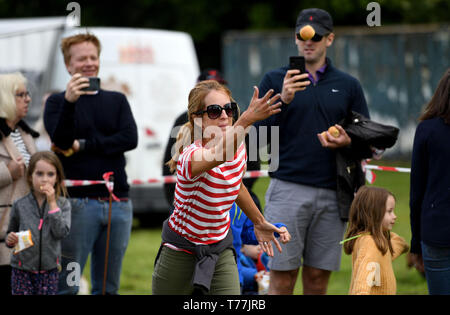 Dorset, UK. 05th May, 2019. Dorset Knob Throwing Festival, Kingston Maurward, Dorchester, Visitors try to see how far they can throw the knob. Credit: Finnbarr Webster/Alamy Live News Stock Photo