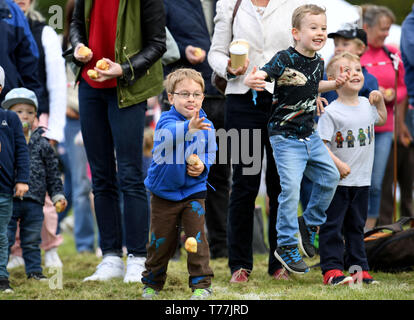 Dorset, UK. 05th May, 2019. Dorset Knob Throwing Festival, Kingston Maurward, Dorchester, Children try to see how far they can throw the knob. Credit: Finnbarr Webster/Alamy Live News Stock Photo