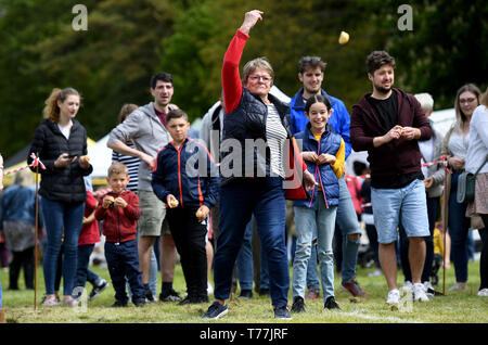 Dorset, UK. 05th May, 2019. Dorset Knob Throwing Festival, Kingston Maurward, Dorchester, Visitors try to see how far they can throw the knob. Credit: Finnbarr Webster/Alamy Live News Stock Photo