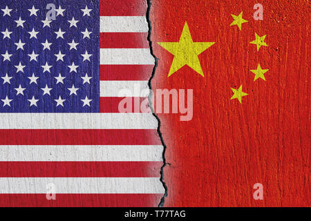 flags United States and China painted on cracked  wall