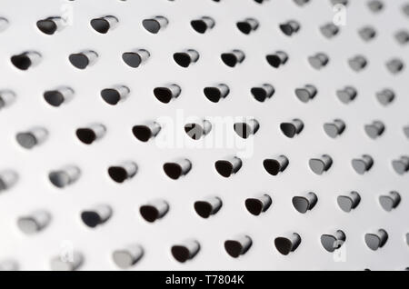 Metal grater extremly close up Stock Photo