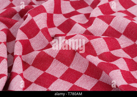 Checkered tablecloth texture as a background, closeup picture. Stock Photo