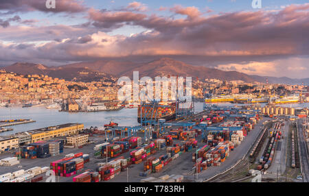 Genova, Genoa, Italy: Aerial view of shipping and container terminal, colorful stacked containers and loading dock side cranes in the port of Genoa Stock Photo