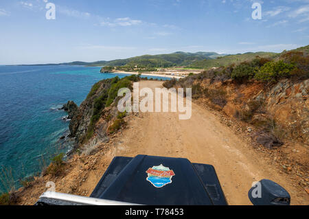 Sithonia, Chalkidiki, Greece - June 27, 2014: SUV car Land Rover Defender 110 driving on the off-road Лэнд Ровер Дефендер 4x4 Греция Ситония Халкидики Stock Photo