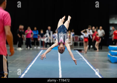 Telford, England, UK. 27 April, 2018. A female gymnast from Spelthorne Gymnastics Club in action during Spring Series 1 at the Telford International Centre, Telford, UK.