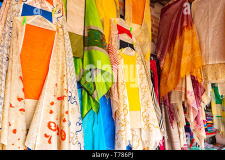 India, New Delhi, 30 Mar 2048 - Souvenirs, jewelry, carpets, clothes and scarfs on traditional market in Delhi Stock Photo