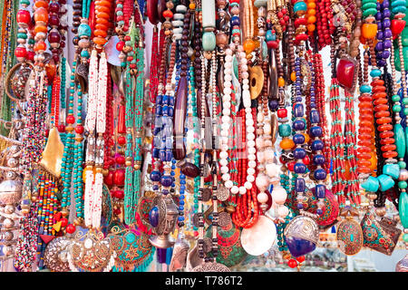 India, New Delhi, 30 Mar 2048 - Souvenirs, jewelry, carpets, clothes and scarfs on traditional market in Delhi Stock Photo