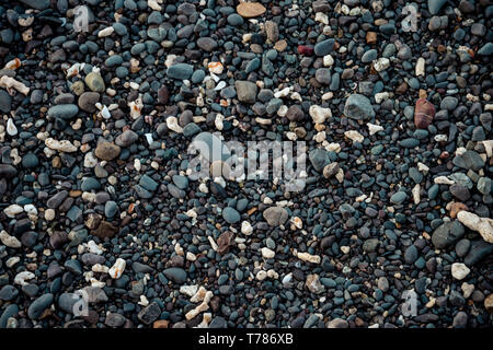 Wet beach stones texture background Stock Photo