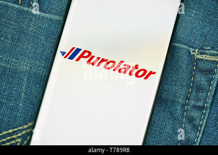 MONTREAL, CANADA - December 23, 2018: Purolator mobile android app on Samsung s8 screen. Purolator Inc. is a Canadian courier that is 91 percent owned Stock Photo