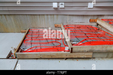 Floor heating pipe of installation on water floor heating system in a building. Stock Photo
