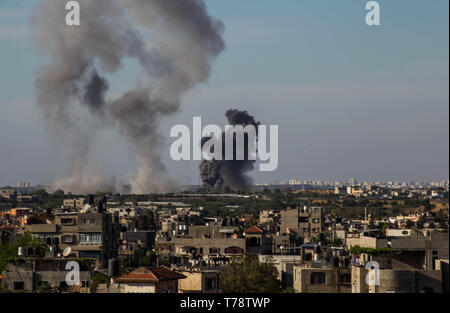 Gaza, Palestine. 04th May, 2019. Smoke rises following an Israeli airstrike in Beit Lahia in the northern Gaza Strip. Gaza militants fired a barrage of dozens of rockets at Israel, which responded with strikes that killed a Palestinian on Saturday, officials said, as a fragile ceasefire again faltered. Credit: Ramez Habboub/Pacific Press/Alamy Live News Stock Photo