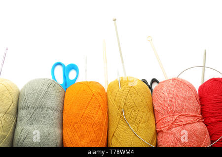 Threads, scissors and knitting needles on white background Stock Photo