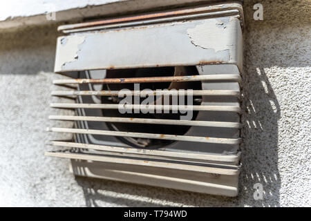 Old exhaust system, built after the Second World War, in a German village. Stock Photo