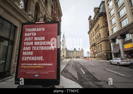 OTTAWA, CANADA - NOVEMBER 12, 2018: Anti NAFTA poster criticizing PM Justin Trudeau social policy in front of the Canadian Parliament, directed by the Stock Photo
