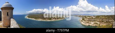 Wide Panoramic Landscape of Cuban Caribbean Sea Coast and Santiago De Cuba Bay from Castillo Del Morro Ancient Fortress (San Pedro de la Roca Castle) Stock Photo