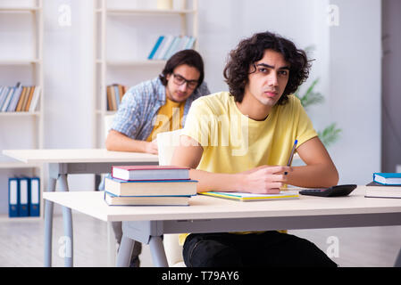 Two male students in the classroom Stock Photo