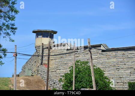 Guard tower and stone wall at an American Prison. Stock Photo