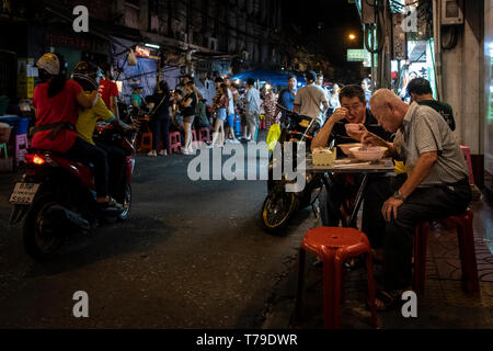 Bangkok, Thailand - 02 September 2018: Eating outside at Bangkok's Chinatown Stock Photo