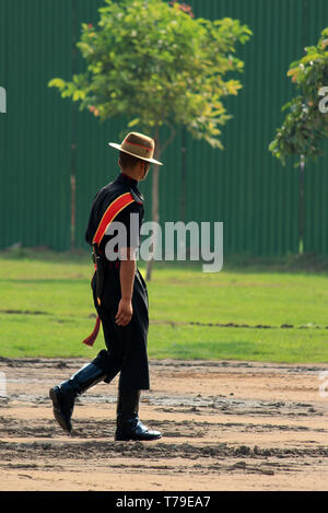 January 2017, New Delhi India, Soldier walking alone after a march in the field. This picture was taken before the Republic Day of India, a soldier after he completed his march/parade. Stock Photo