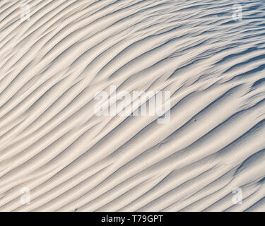 Wave like patterns in the white sand dunes of Isla Magdalena, Baja California Sur, Mexico. Stock Photo